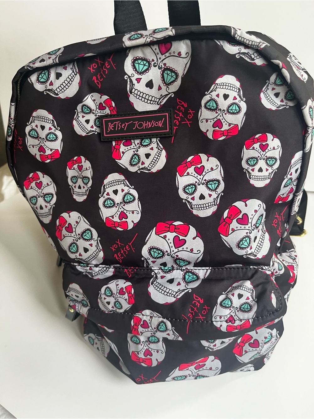 Betsey Johnson Black Backpack with Pink & Teal Skull Print